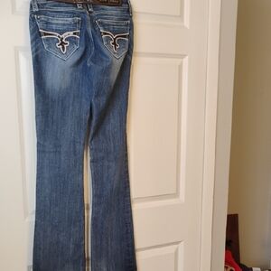Rock Revival Blue Boot Cut Jeans with Distressed Details
